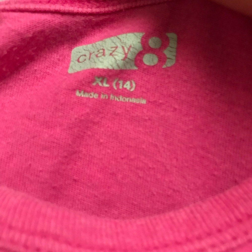 a hot pink shirt
